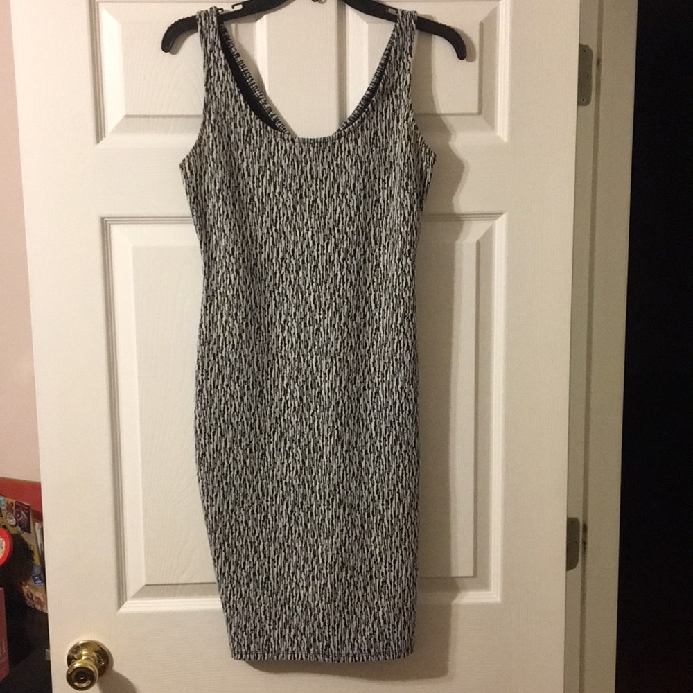 Sexy Bar lll Dress with small slit on one side